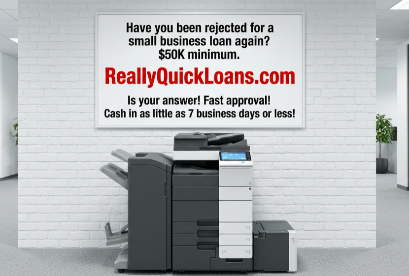 A screenshot image of a large commercial copier. With a huge sign above it on the wall.