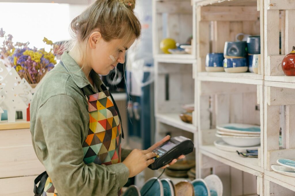 Woman holding a POS machine
